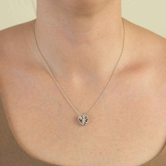 Black Hills Gold Pink & Green Leaf Winged Angel Heart Pendant in Sterling Silver front view