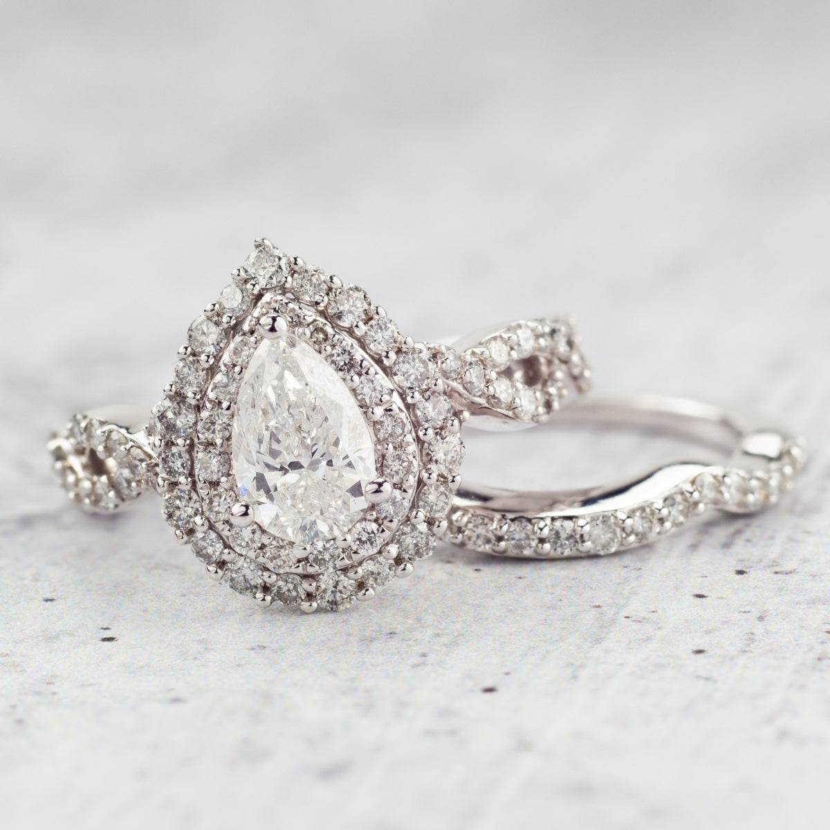 Amaura Collection 2 ct. tw. Pear-Shaped Double Halo Diamond Wedding Set with Twist Band in 14K White Gold side profile