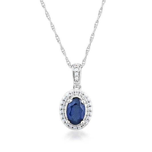 Blue Sapphire and .08 ct. tw. Diamond Oval Halo Pendant in 10K White Gold