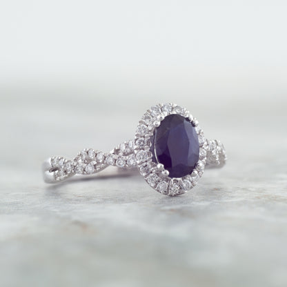 Genuine Oval Blue Sapphire Fashion Ring with 1/3 ct. tw. Diamond Halo & Twist Band in 10K White Gold side profile