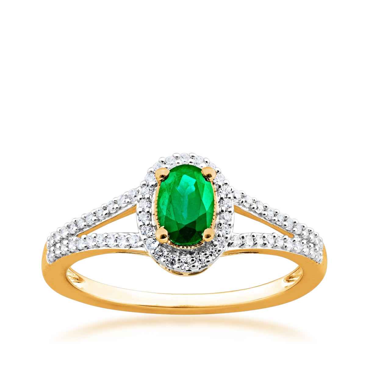 Green Oval Emerald and 1/6 ct. tw. Diamond Fashion Ring with Halo