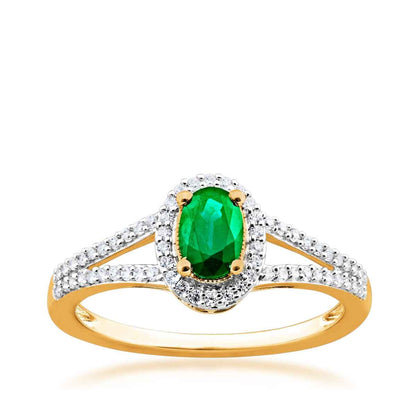 Green Oval Emerald and 1/6 ct. tw. Diamond Fashion Ring with Halo