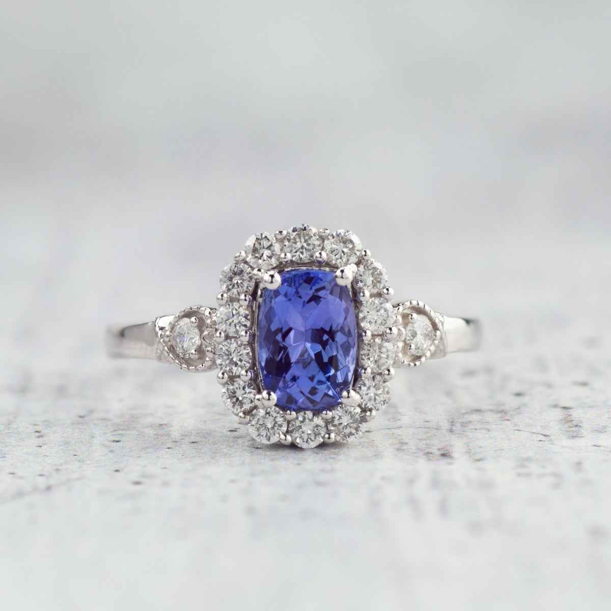Kallati Cushion Tanzanite & 3/8 ct. tw. Diamond Halo Ring with Milgrain Detailing in 14K White Gold front view