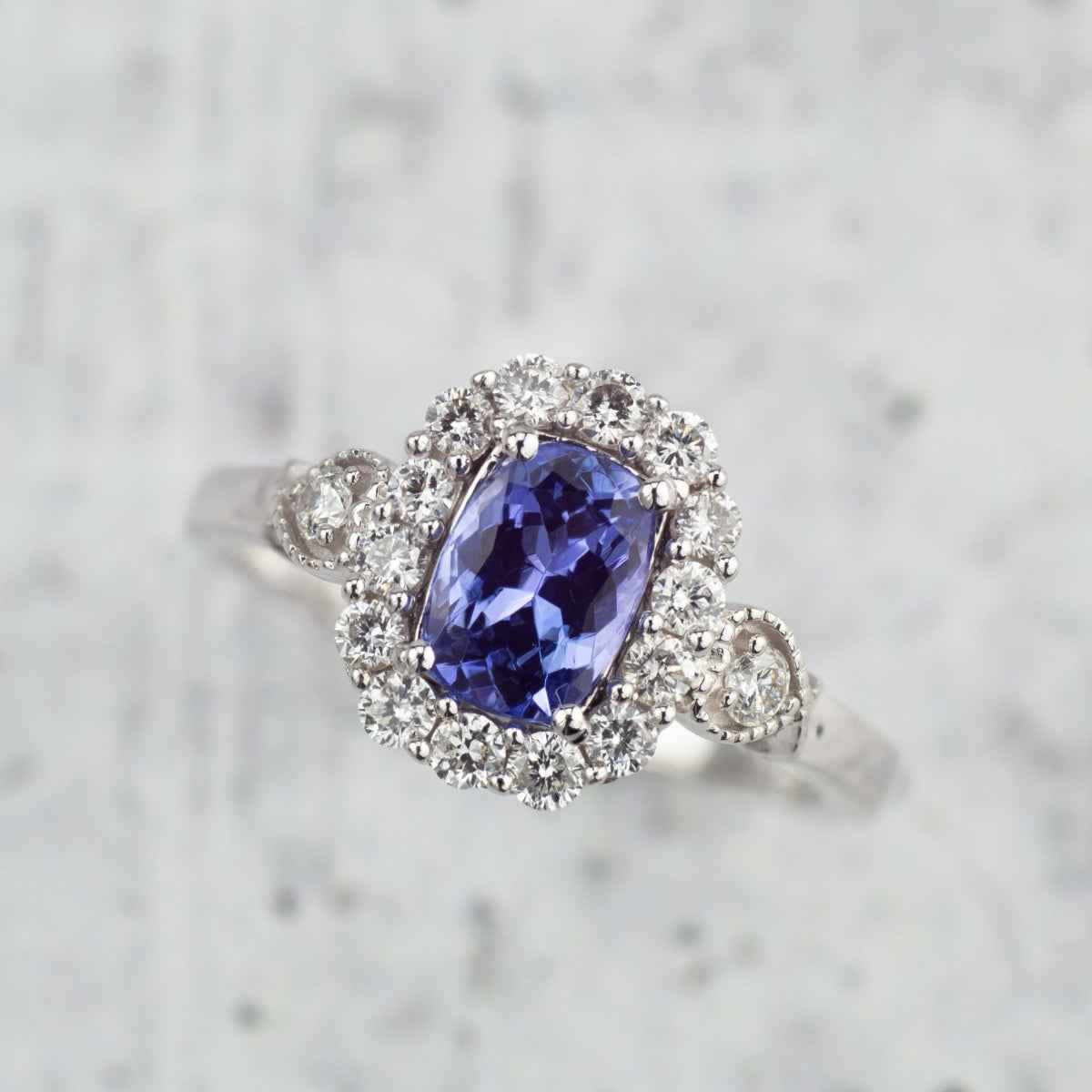 Kallati Cushion Tanzanite & 3/8 ct. tw. Diamond Halo Ring with Milgrain Detailing in 14K White Gold close-up detail