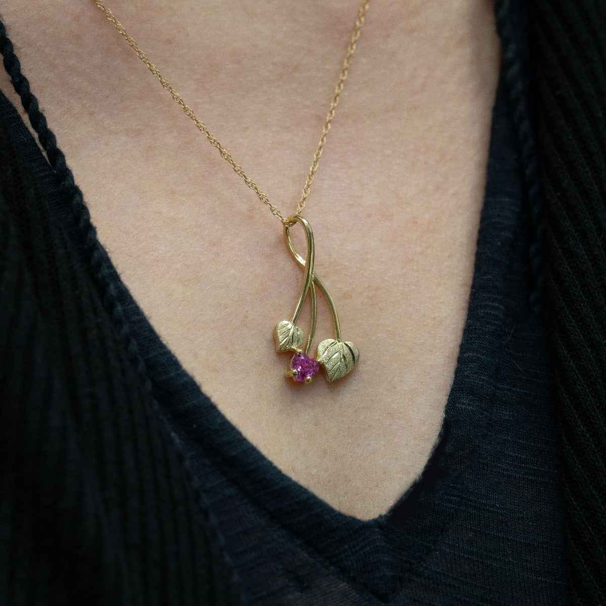 Black Hills Gold Created Heart Pink Sapphire & Double Green Leaf Pendant in 10K Yellow Gold close-up detail