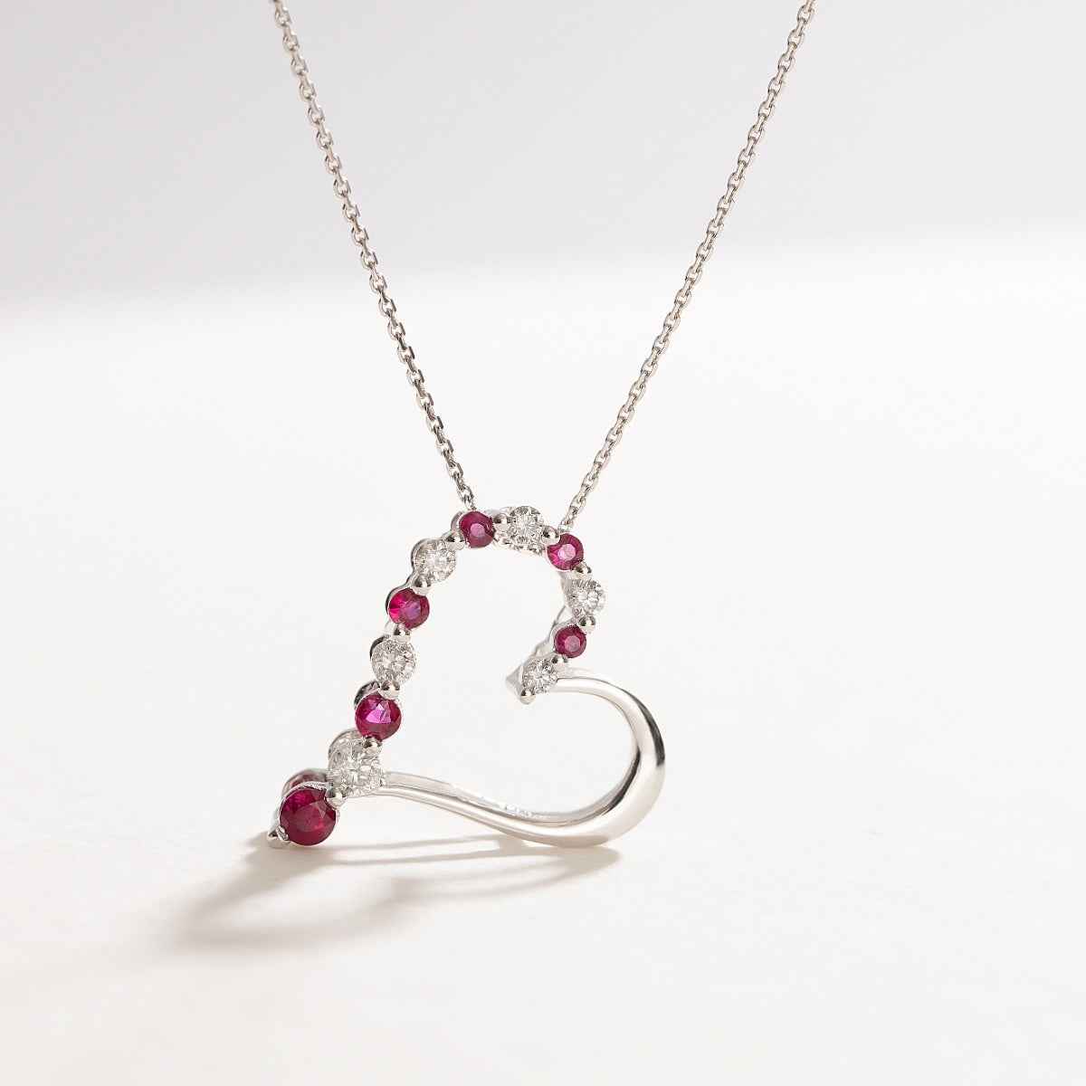 Journey Collection 1/10 ct. tw. Diamond and Ruby Heart Pendant in 10K White Gold front view