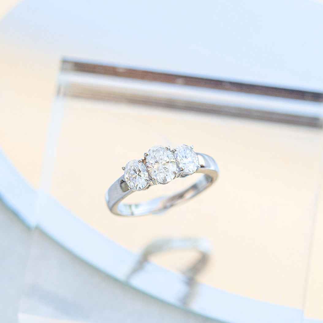 Adamante 1-1/2 ct. tw. Lab-Grown Oval Diamond 3-Stone Ring in 10K White Gold front view