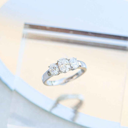 Adamante 1-1/2 ct. tw. Lab-Grown Oval Diamond 3-Stone Ring in 10K White Gold front view