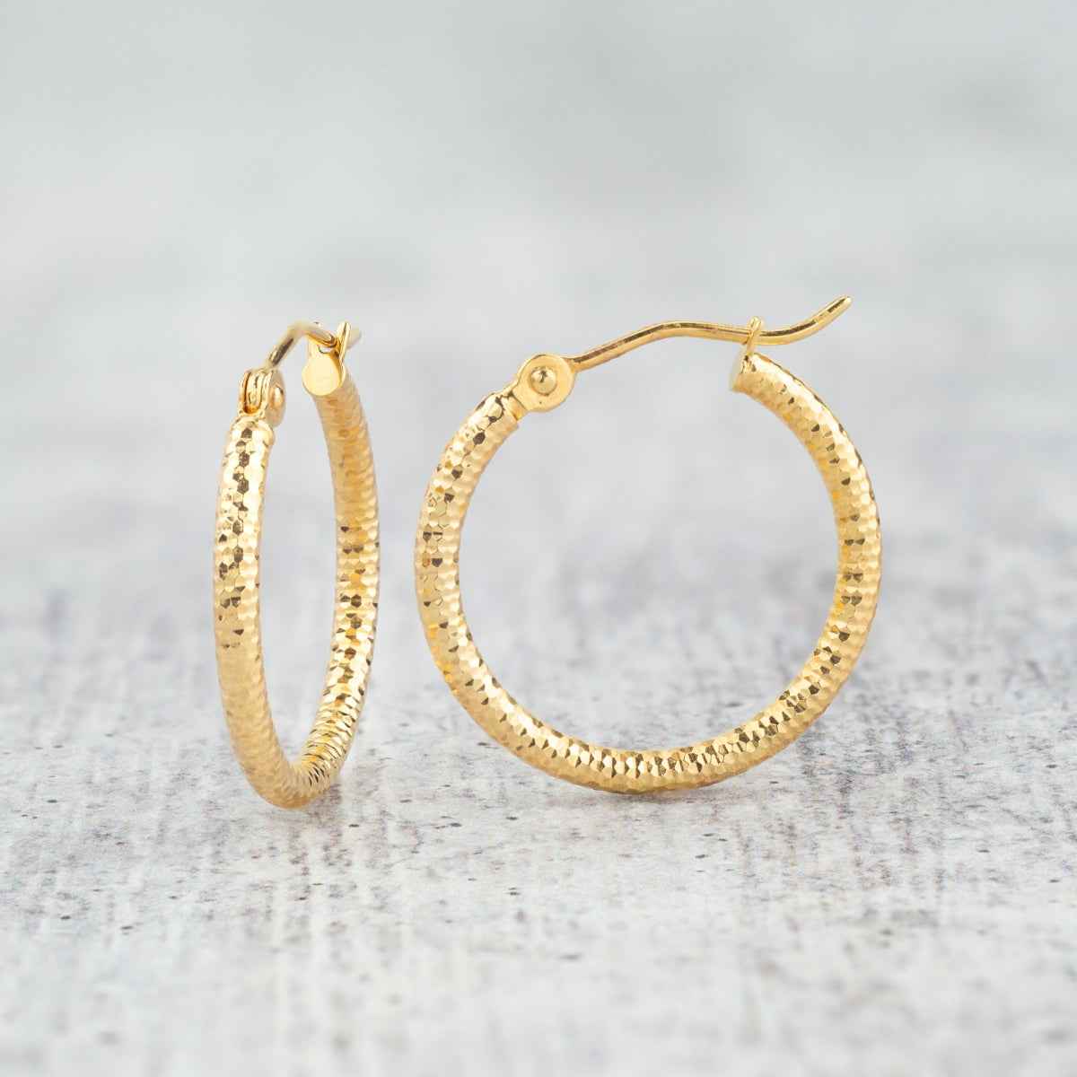 2X20mm Diamond Cut Hoop Earrings in 14K Yellow Gold front view