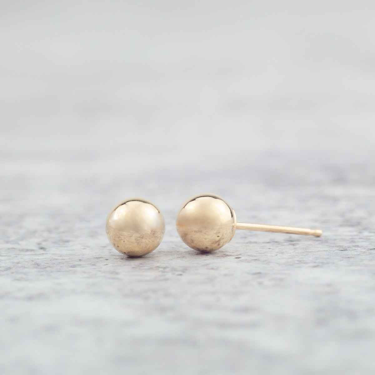 5mm Polished Ball Stud Earrings in 14K Yellow Gold front view