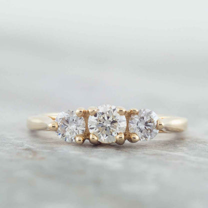 3/4 ct. tw. Round Brilliant Diamond 3-Stone Anniversary Ring in 14K Yellow Gold close-up detail