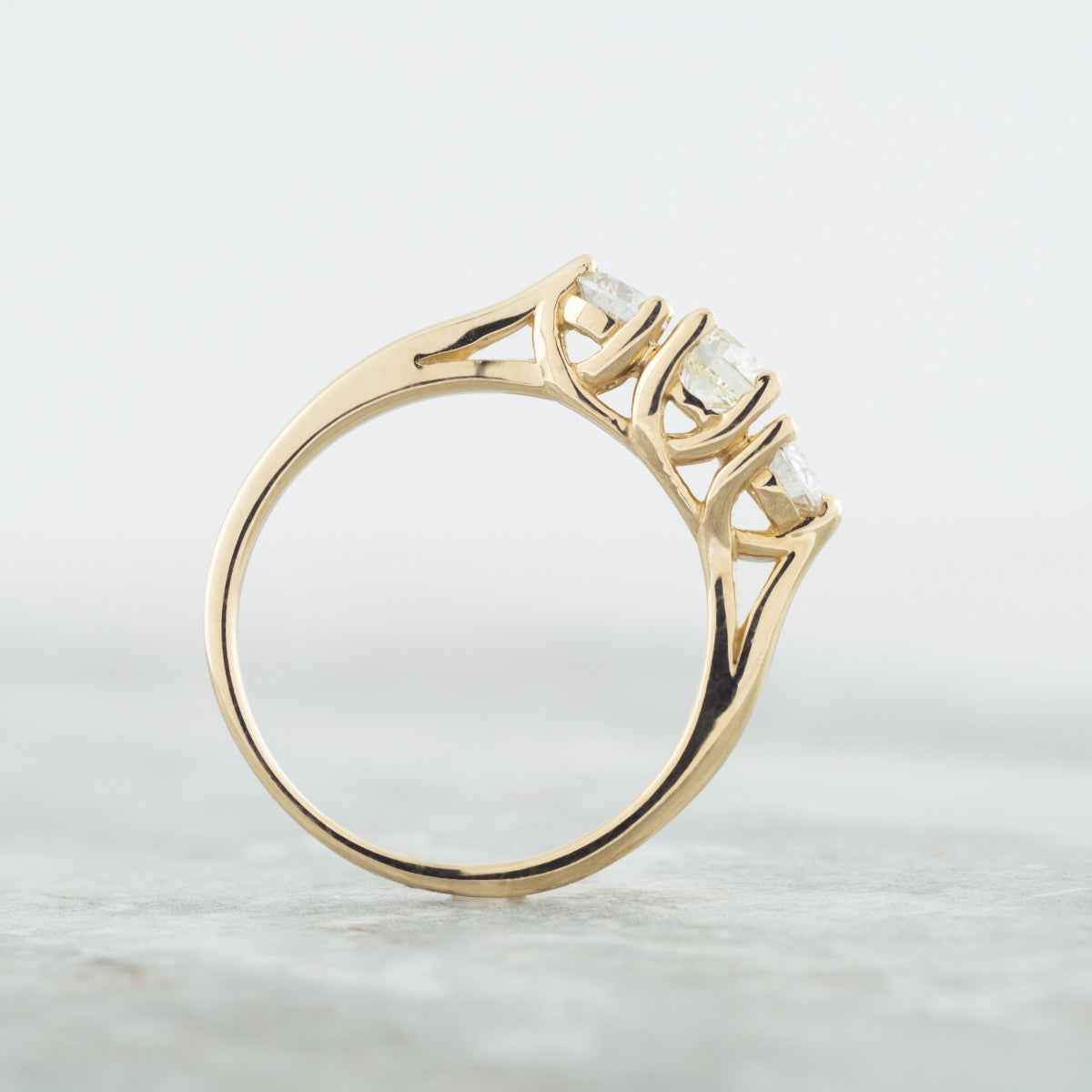 3/4 ct. tw. Round Brilliant Diamond 3-Stone Anniversary Ring in 14K Yellow Gold side profile