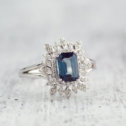 Emerald Cut London Blue Topaz & 1/5 ct. tw. Diamond Starburst Halo Ring 10K White Gold side profile