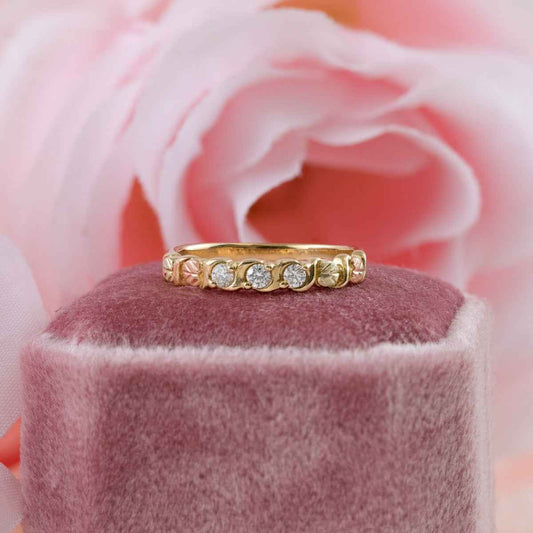 Black Hills Gold 1/7 ct. tw. Round 3-Stone Diamond Anniversary Ring in 10K Yellow Gold close-up detail