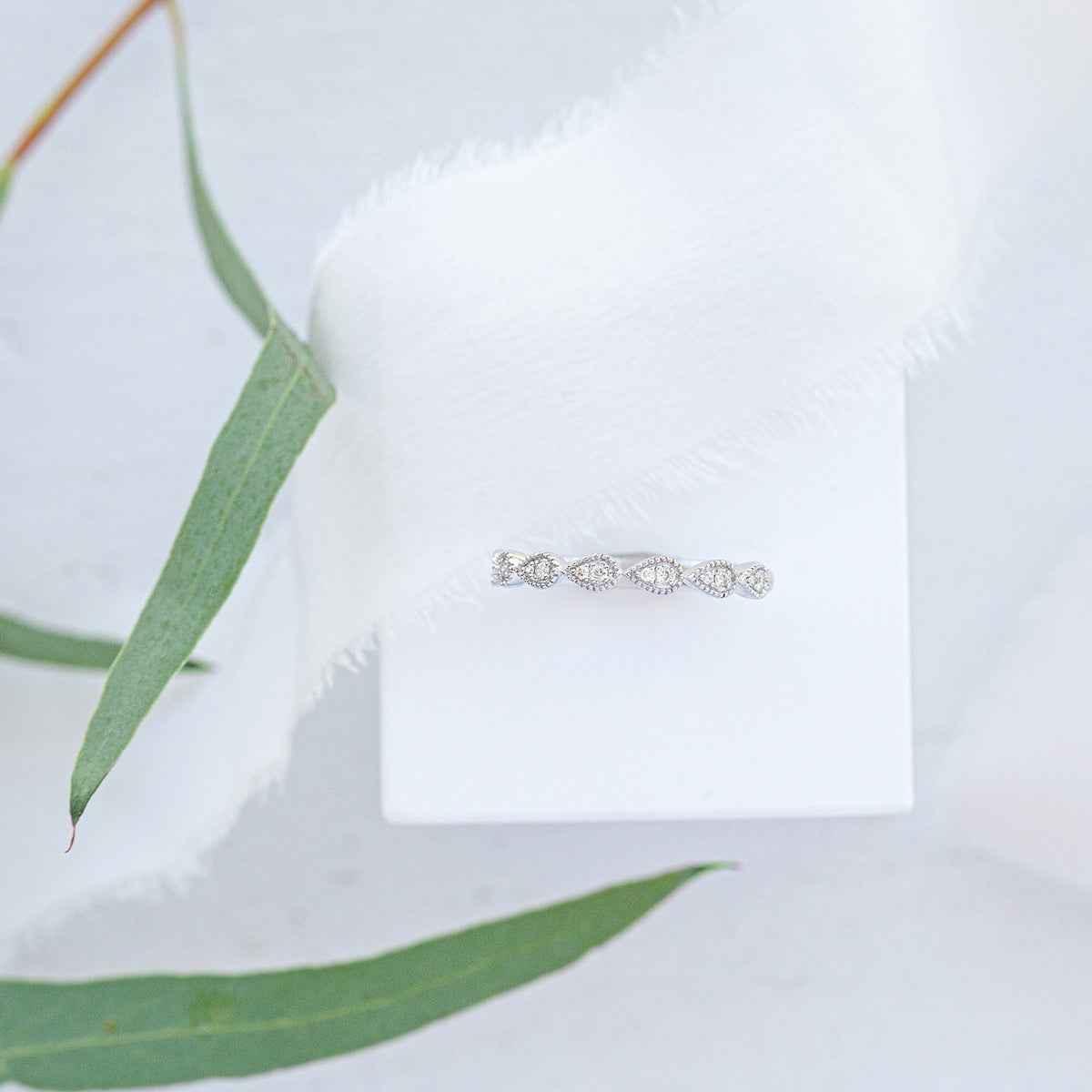Perfect Match .08 ct. tw. Diamond Stackable Anniversary Ring with Tear Drop Shaped Detailing in 10K White close-up detail