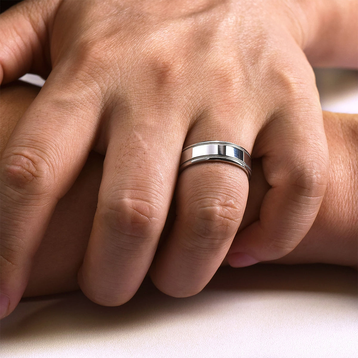 Gabriel & Co. Fred Men's 7mm Polished Finish Wedding Ring in 14K White Gold close-up detail
