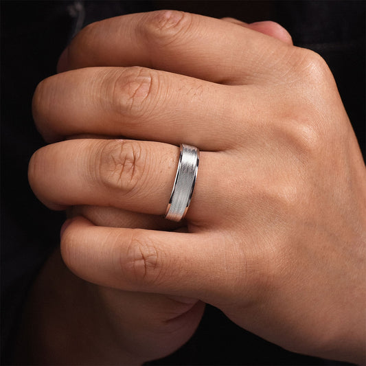 Gabriel & Co. Jacob Men's 6mm Brushed Finish Polished Edge Wedding Ring in 14K White Gold close-up detail