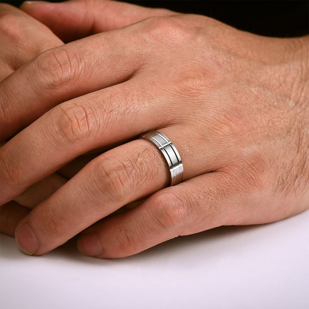 Gabriel & Co. Henry Men's 6mm Satin Finish Checkered Wedding Ring in 14K White Gold close-up detail