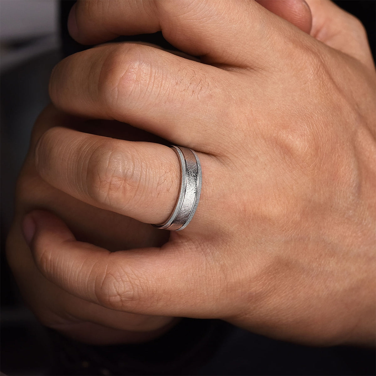 Gabriel & Co. Stuart Men's 6mm Sandblast Finish Textured Edge Wedding Ring in 14K White Gold close-up detail