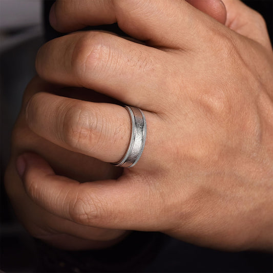 Gabriel & Co. Stuart Men's 6mm Sandblast Finish Textured Edge Wedding Ring in 14K White Gold close-up detail