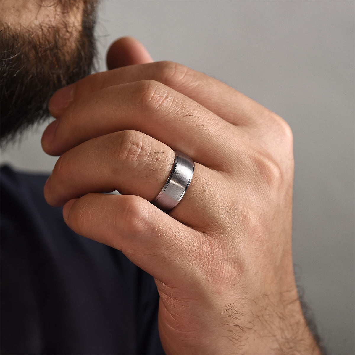 Gabriel & Co. Nathaniel Men's 8mm Satin Finish Polished Edge Wedding Ring in 14K White Gold close-up detail