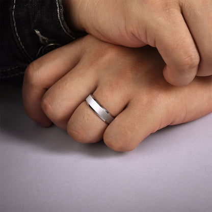 Gabriel & Co. Isaiah Men's 6mm Satin Finish Beveled Edge Wedding Ring in 14K White Gold close-up detail