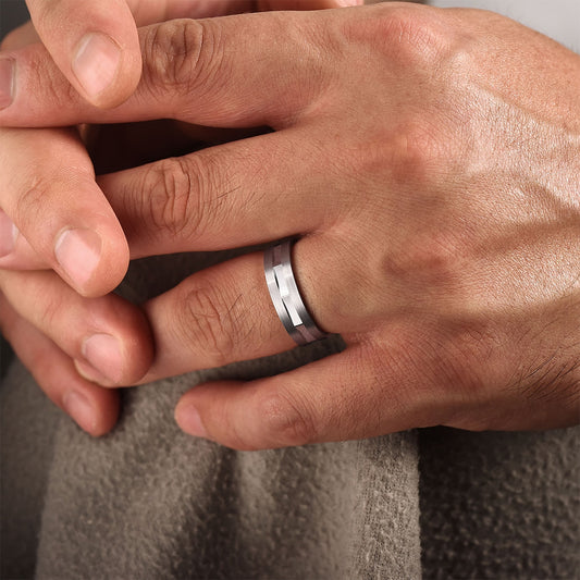 Gabriel & Co. Elias Men's 6mm Satin Finish Groove & Brushed Edge Wedding Ring in 14K White Gold close-up detail