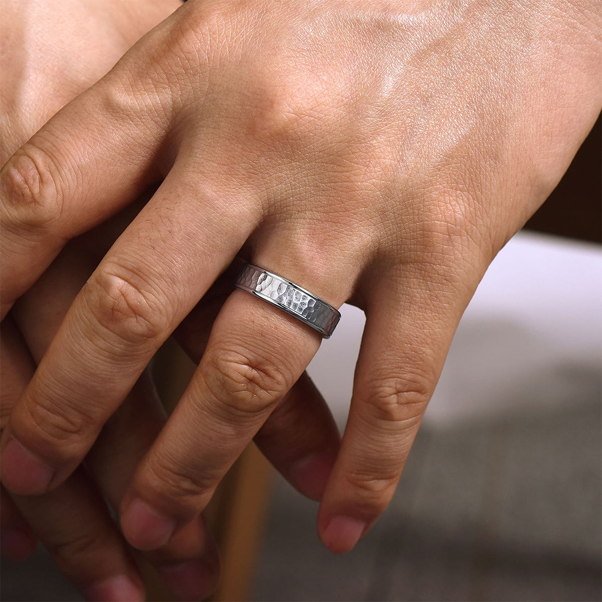 Gabriel & Co. George Men's 6mm Hammered Finish Polished Edge Wedding Ring in 14K White Gold close-up detail