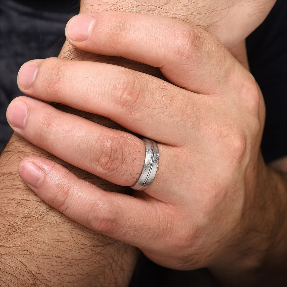Gabriel & Co. Kayden Men's 6mm Brushed Finish & Polished Center Line Wedding Ring in 14K White Gold close-up detail