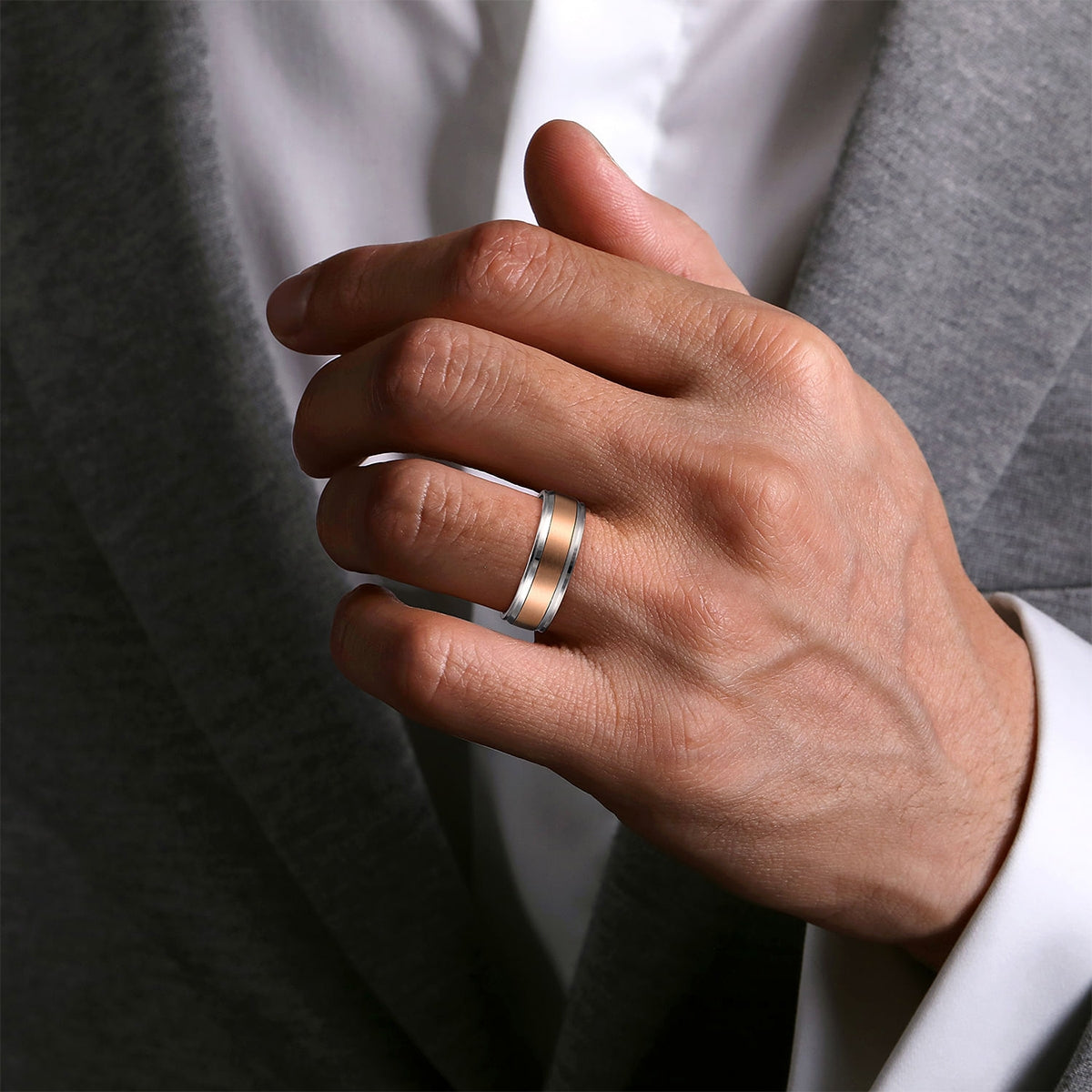 Gabriel & Co. Gabriel Men's 7mm Satin Finish Polished Edge Wedding Ring in 14K Pink & White close-up detail