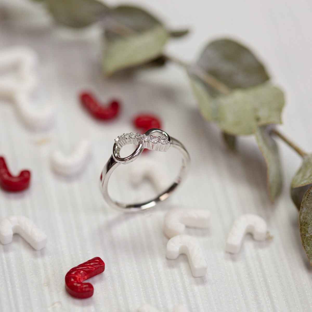 Journey collection 1/10 ct. tw. Diamond Infinity Fashion Ring in 10K White Gold close-up detail