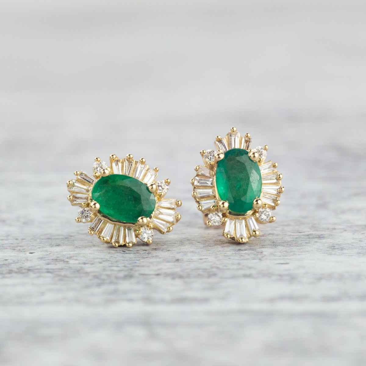 Emerald and Diamond 1/4 ct. tw. Round and Baguette Halo Earrings in 10K Yellow Gold front view