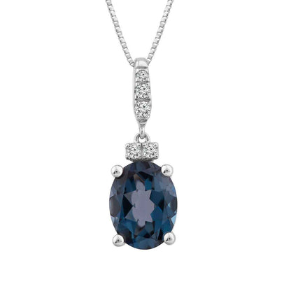 Oval London Blue Topaz & Diamond Accent Drop Pendant in 10K White Gold