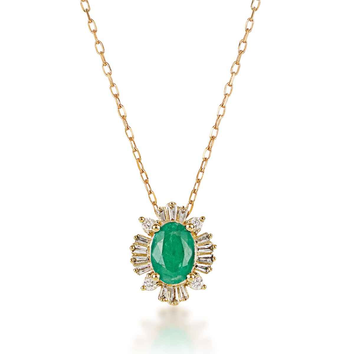 Oval Emerald & 1/6 ct. tw. Round & Baguette Diamond Starburst Halo Pendant in 10K Yellow Gold