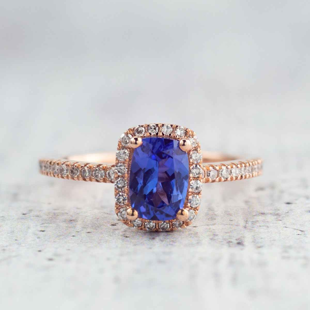Cushion Tanzanite & 1/4 ct. tw. Diamond Halo Ring in 10K Pink Gold front view