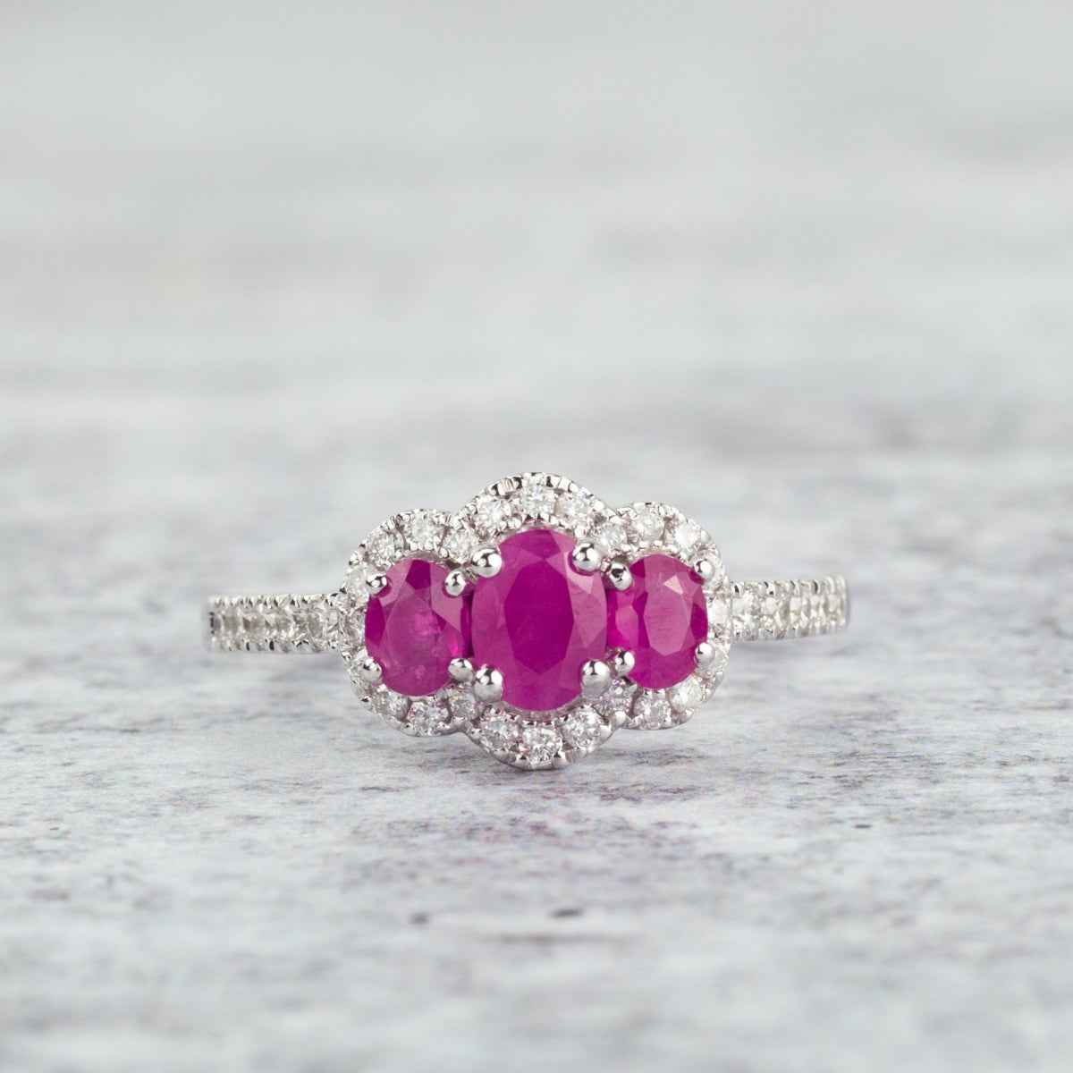 3-Stone Oval Ruby & 1/3 ct. tw. Diamond Halo Ring in 14K White Gold close-up detail
