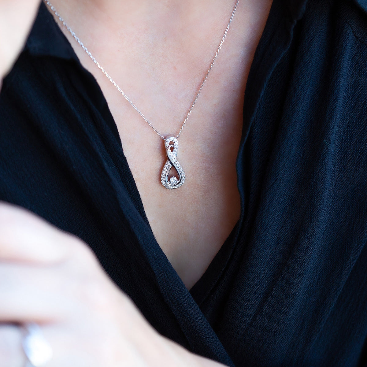 Infinite Love 1/2 ct. tw. Diamond Infinity Pendant in 10K White Gold front view