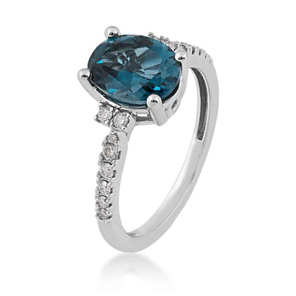Oval London Blue Topaz and 1/5 ct. tw. Diamond Ring in 10K White Gold front view