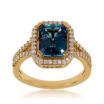 Emerald Cut London Blue Topaz & 1/3 ct. tw. Diamond Halo Ring in 10K Yellow Gold