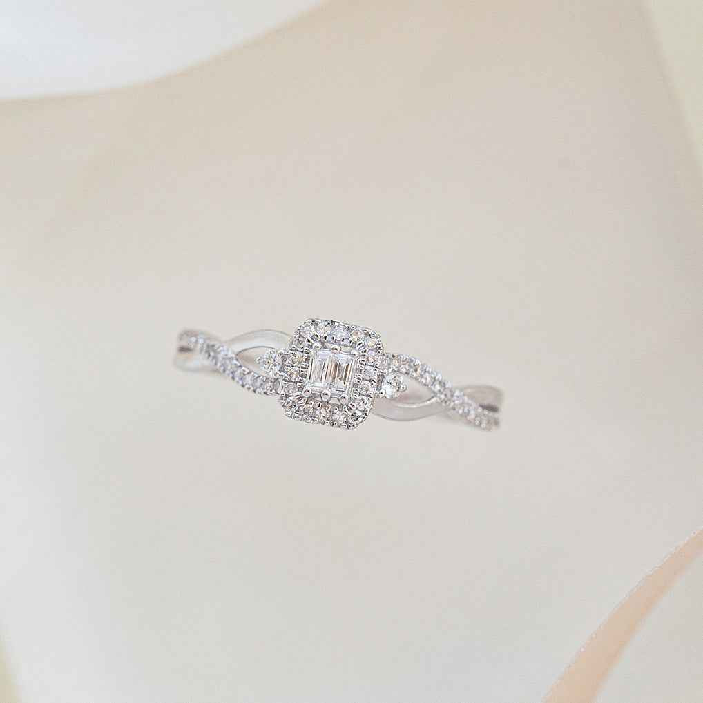 Infinite Love 1/4 ct. tw. Baguette Cluster Halo Twist Band Promise Ring in 10K White Gold front view