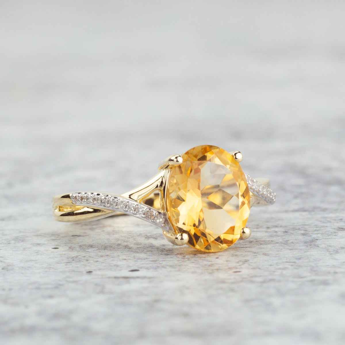 Oval Citrine & Diamond Accent Ring with Twist Band in 10K Yellow Gold close-up detail