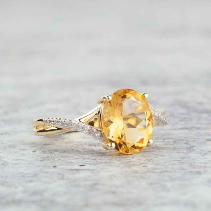 Oval Citrine & Diamond Accent Ring with Twist Band in 10K Yellow Gold close-up detail