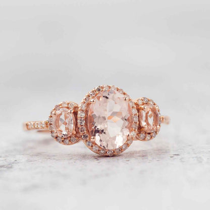 Oval Morganite & 1/5 ct. tw. Diamond Halo 3-Stone Ring in 10K Pink Gold close-up detail