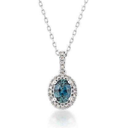 American Colors Oval Montana Sapphire and 1/7 ct. tw. Diamond Halo Pendant in 10K White Gold