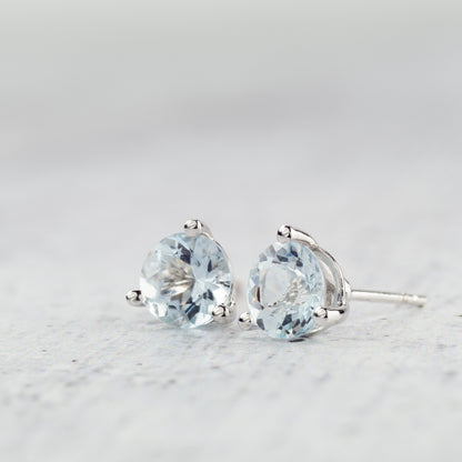 6mm Round Aquamarine Stud Earrings in 10K White Gold side profile