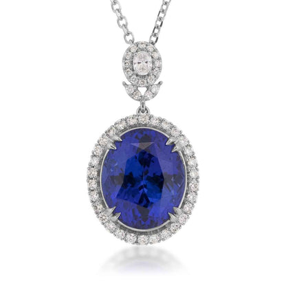 Oval Tanzanite & 1/2 ct. tw. Diamond Halo Pendant in 18K White Gold