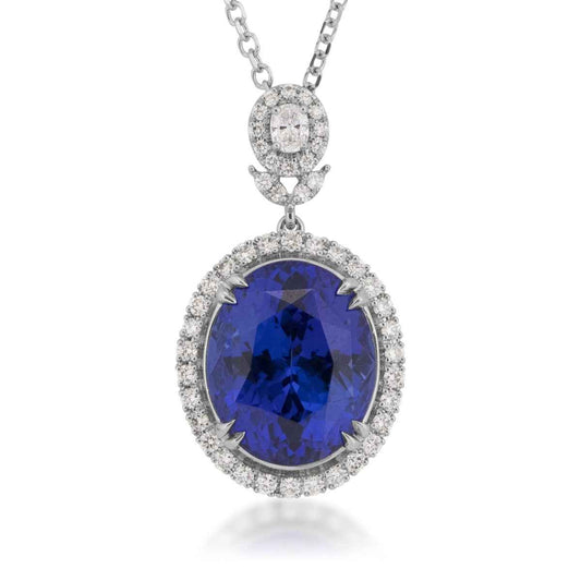 Oval Tanzanite & 1/2 ct. tw. Diamond Halo Pendant in 18K White Gold