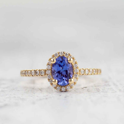 Oval Tanzanite & 1/5 ct. tw. Diamond Halo Ring in 14K Yellow Gold front view