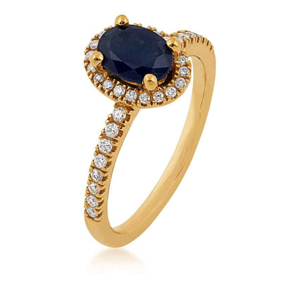Oval Sapphire & 1/5 ct. tw. Diamond Halo Ring in 14K Yellow Gold front view
