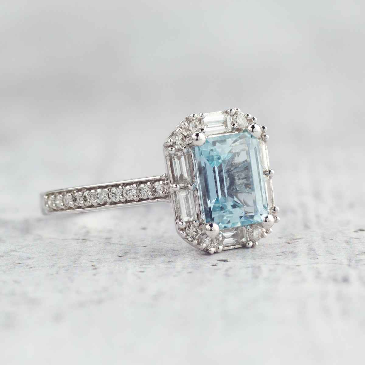 Emerald Cut Aquamarine & 1/2 ct. tw. Diamond Halo Ring in 14K White Gold close-up detail